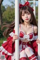 A woman in a red and white dress sitting on a pole.